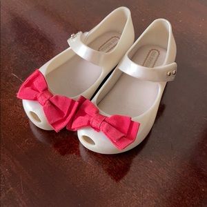 Girls Melissa sandals with red bow